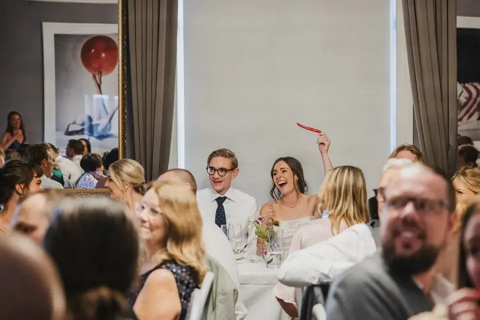A documentary photograph from a wedding dinner.