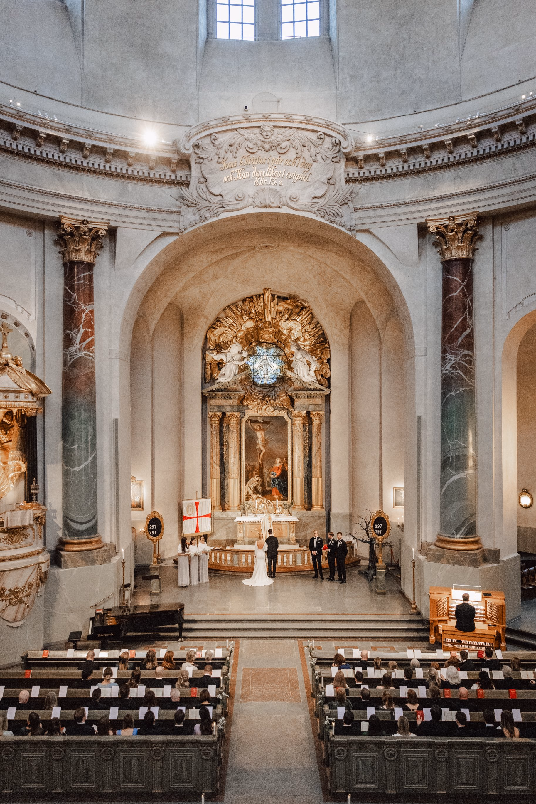 Wedding ceremony inside an ornate church
