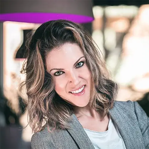 Priscila, founder and lead photographer at WeddingStudio