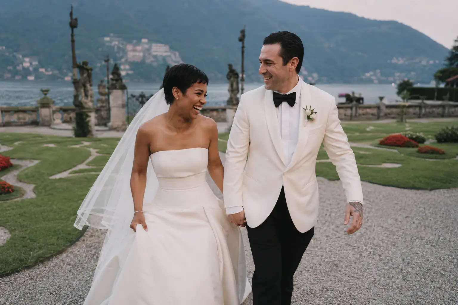 Lake Como wedding couple walking through the gardens of Villa Sola Cabiati during an intimate destination wedding.