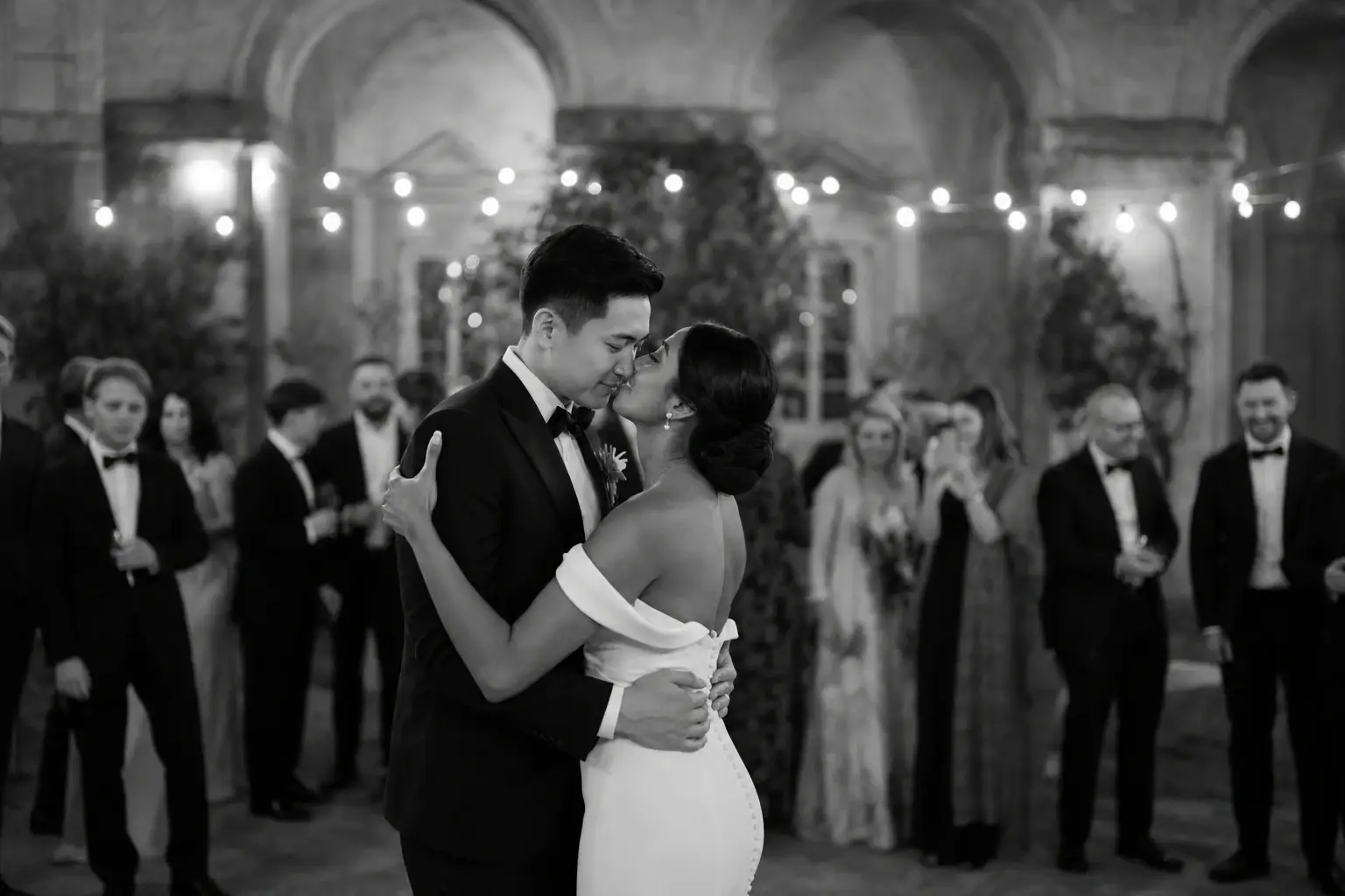 Bride and groom sharing their first dance at Villa Cetinale during an evening wedding reception in Tuscany.