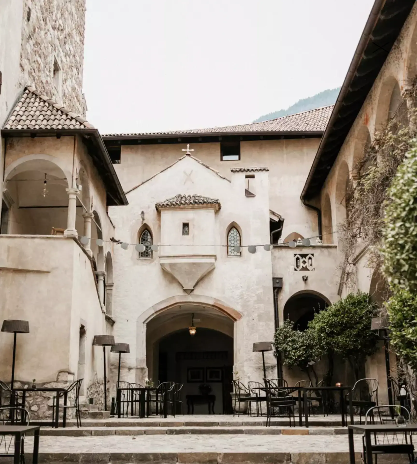 Courtyard entrance of a historic mountain building.