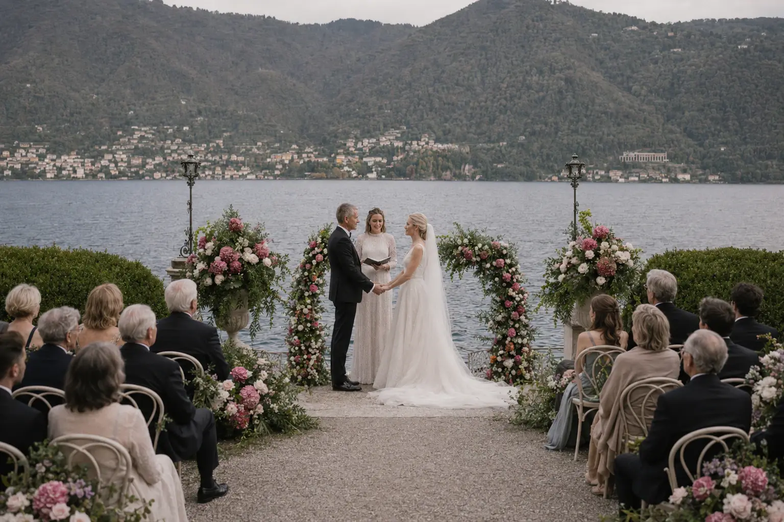 Couple exchanging vows during a lakeside ceremony at Villa Erba.