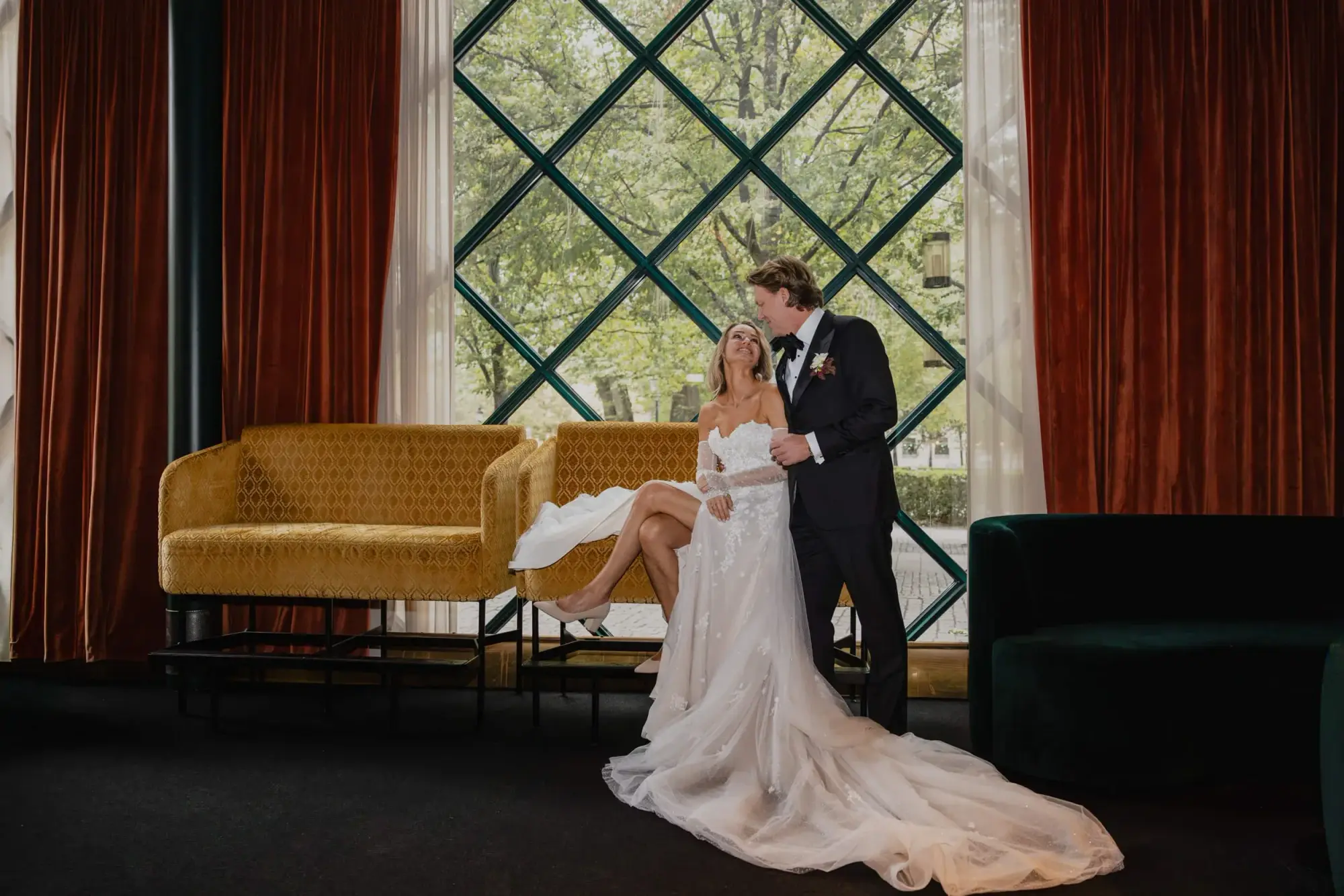 Italian bride Vanessa and Danish groom Jens sharing a relaxed moment at Café Opera