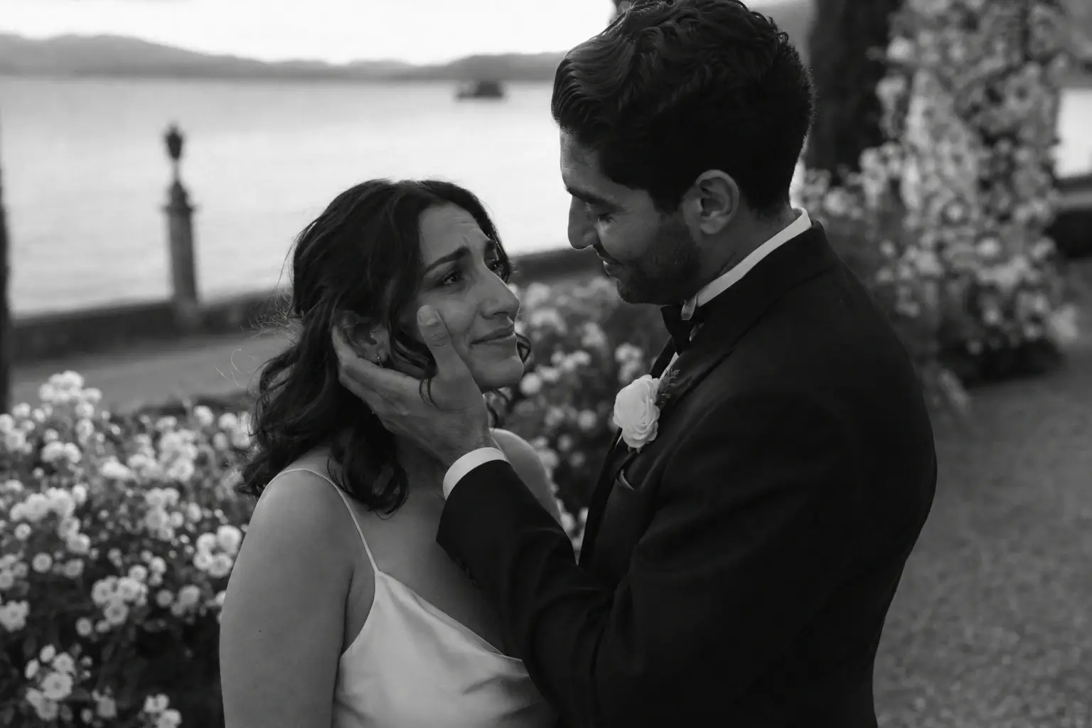 Newlyweds sharing a quiet moment during dinner.