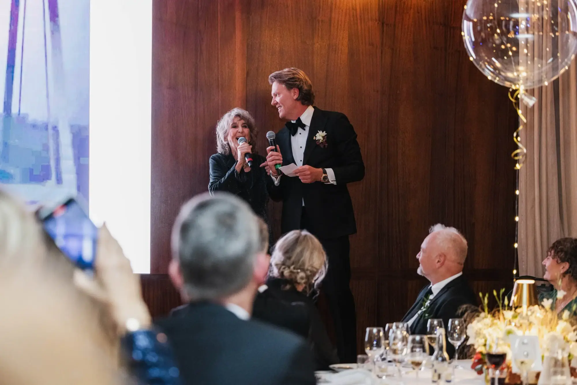 Siw Malmkvist performing with the groom during a surprise moment at the Café Opera wedding